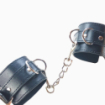 Menottes simili cuir triple anneaux mousquetons
