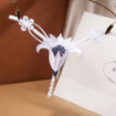 String ouvert broderie perles